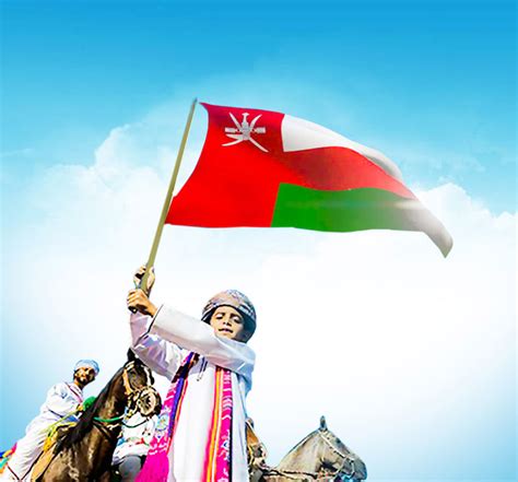 طفل يحمل علم عمان